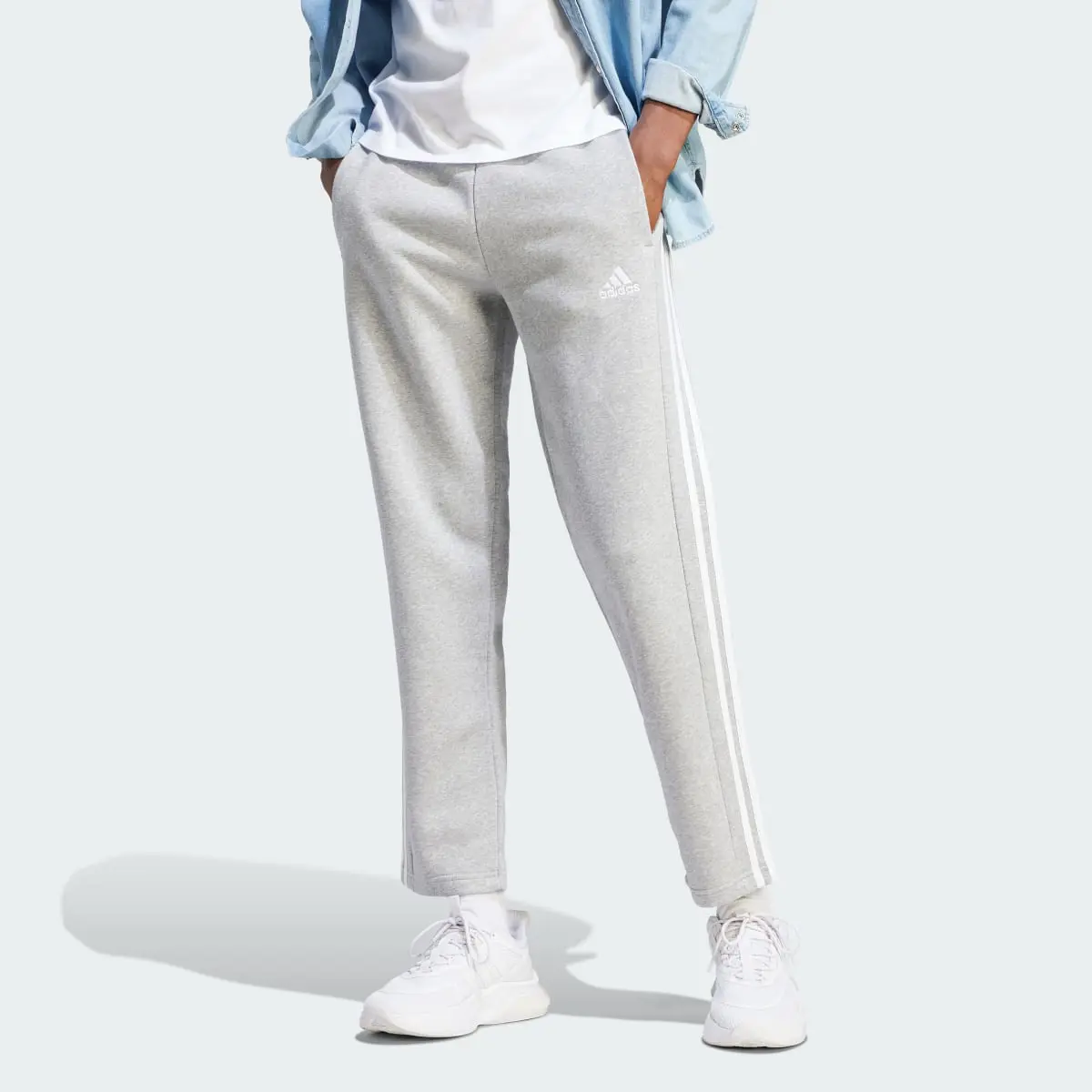 Adidas Essentials 3-Stripes Open Hem Fleece Pants. 1