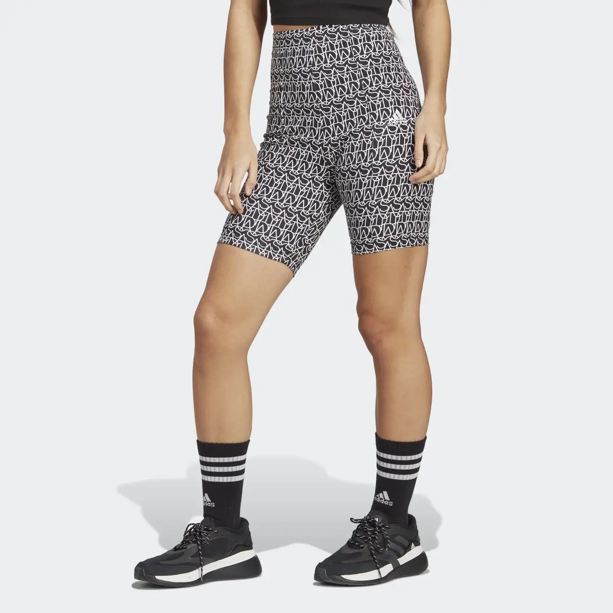 Adidas Allover adidas Graphic Biker Shorts. 1