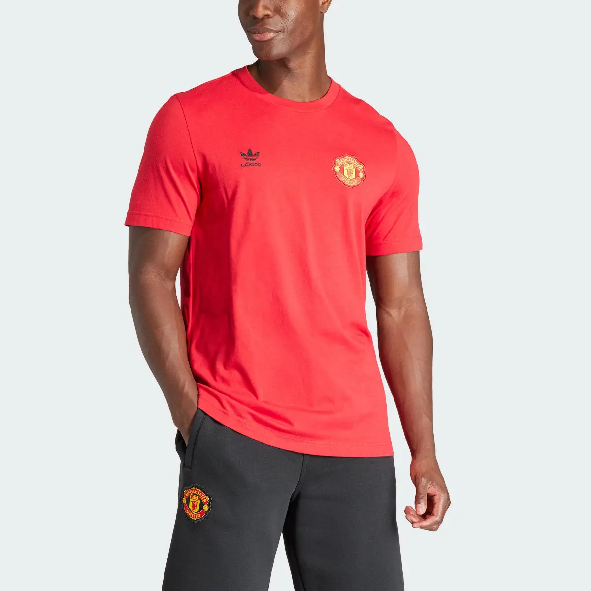 Adidas Manchester United Essentials Trefoil Tee. 1