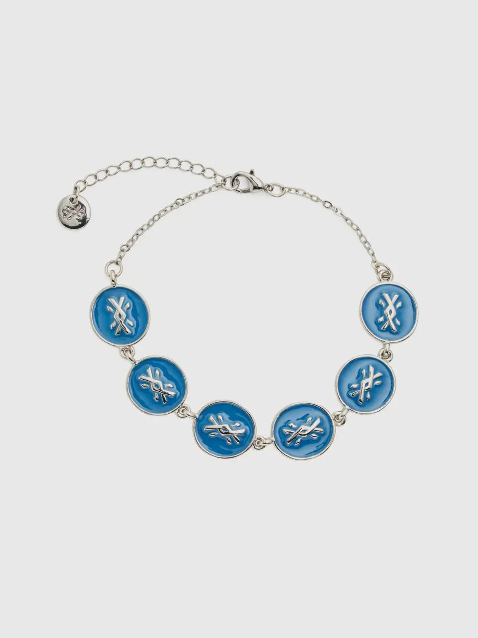 Benetton silver bracelet with sky blue pendants. 1