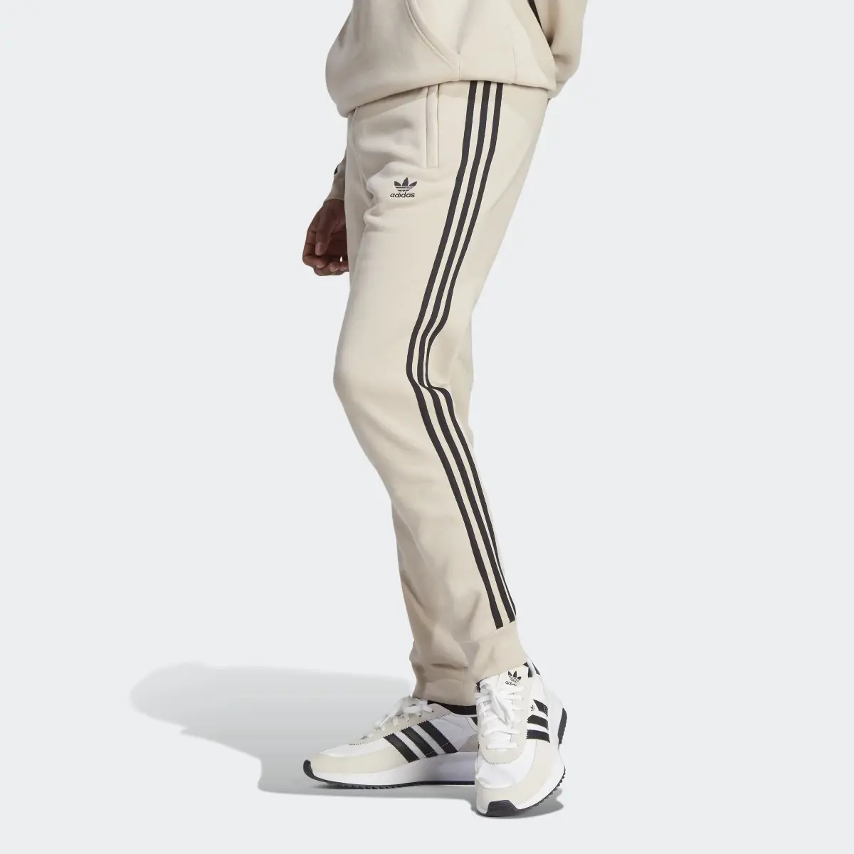 Adidas Pantaloni adicolor Classics 3-Stripes. 1