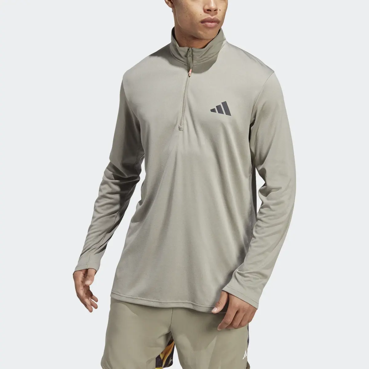 Adidas Train Essentials Seasonal Training 1/4-Zip Long Sleeve Sweatshirt. 1