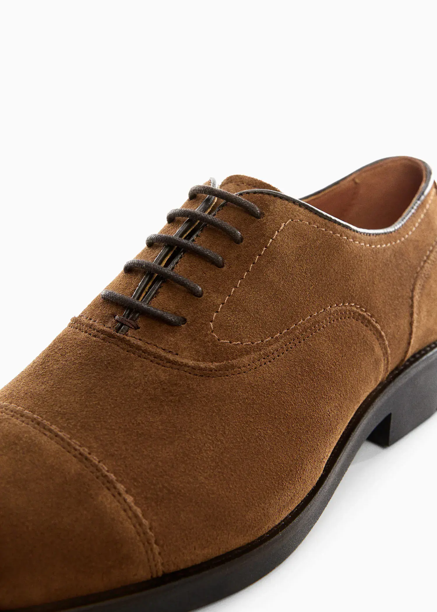 Mango Split leather suit shoes. a close-up view of a pair of brown shoes. 