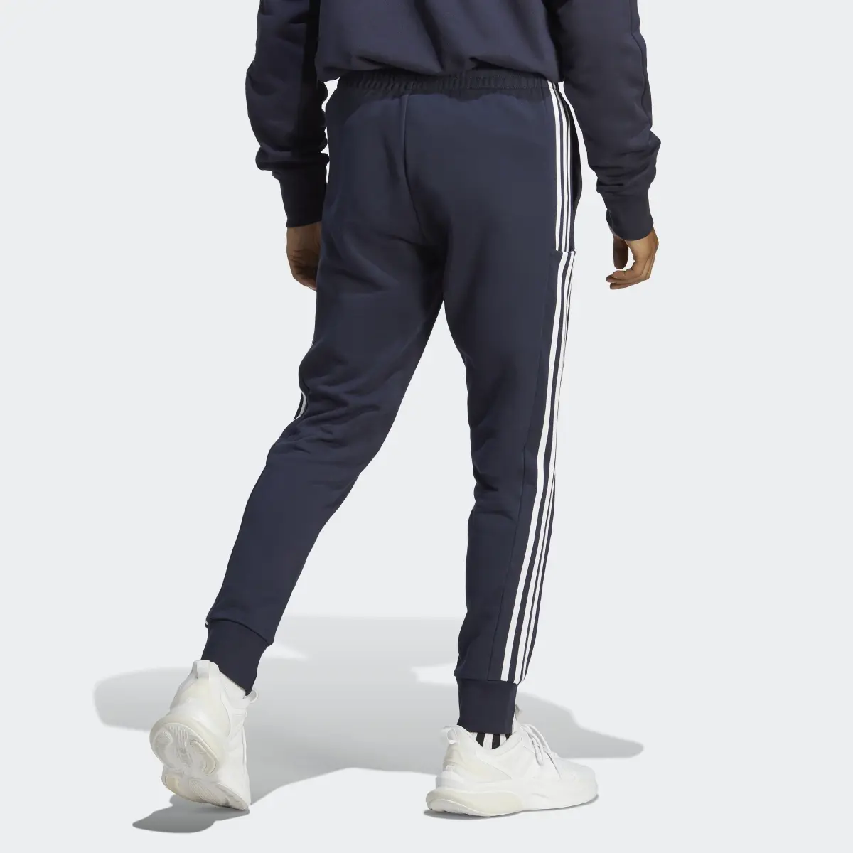 Adidas Essentials French Terry Tapered Cuff 3-Stripes Joggers. 2