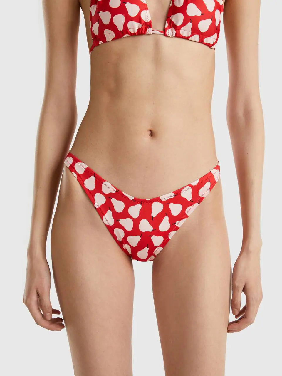 Benetton red swim bottoms with pear pattern. 1