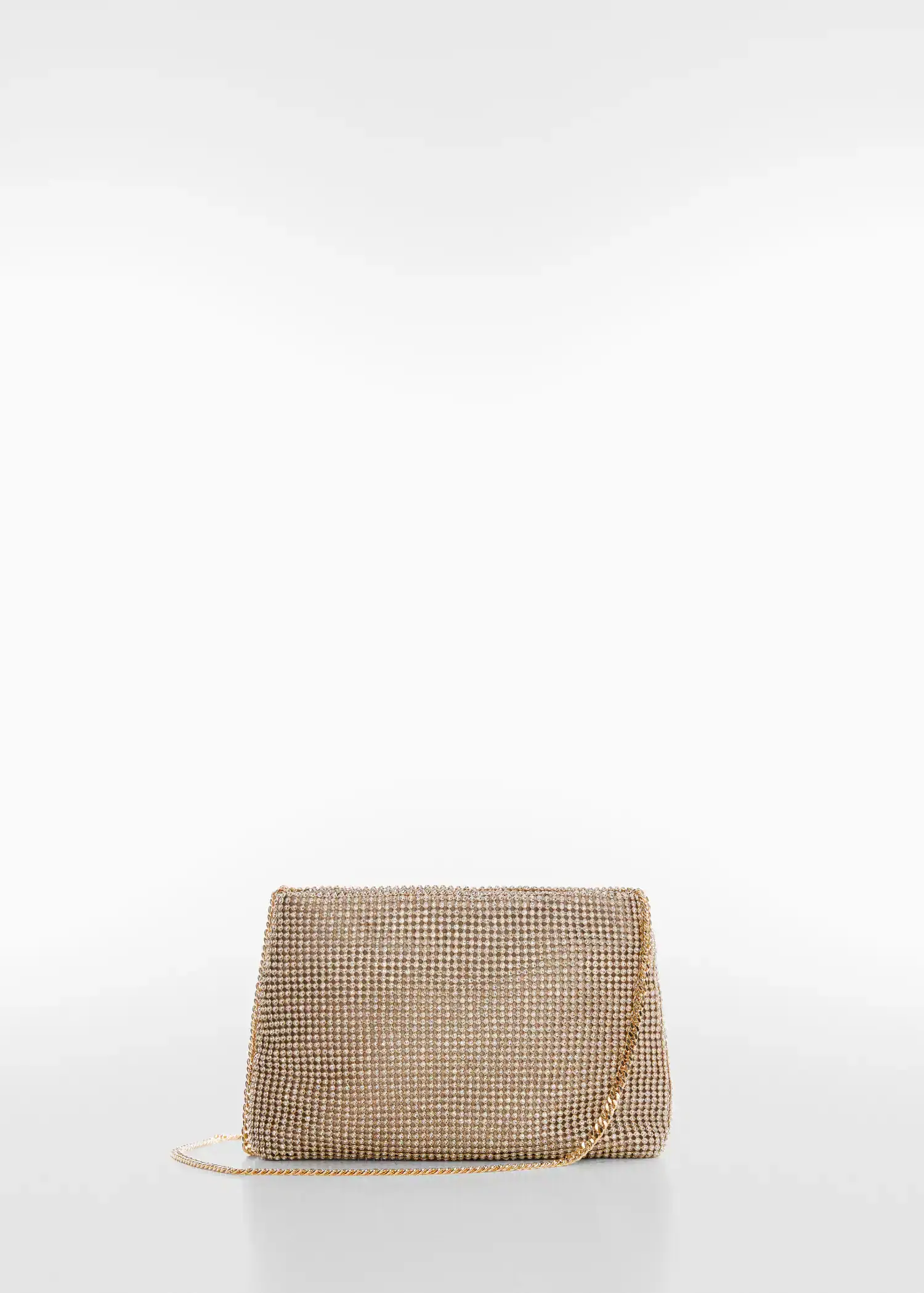 Mango Rhinestone chain bag. a gold purse sitting on top of a white table. 