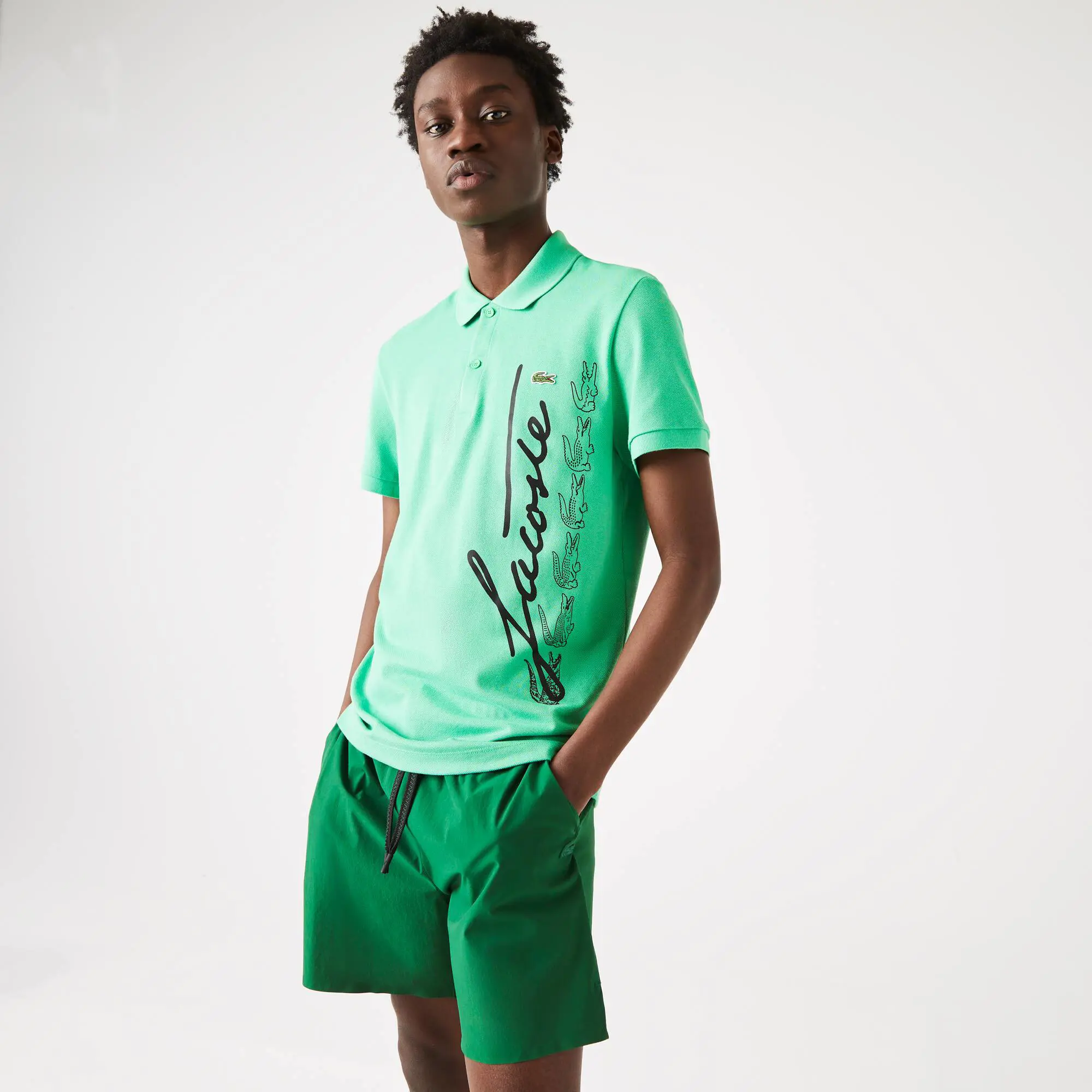 Lacoste Men's Regular Fit Signature Cotton Piqué Polo. 1 Lacoste Men's Regular Fit Signature Cotton Piqué Polo. 1