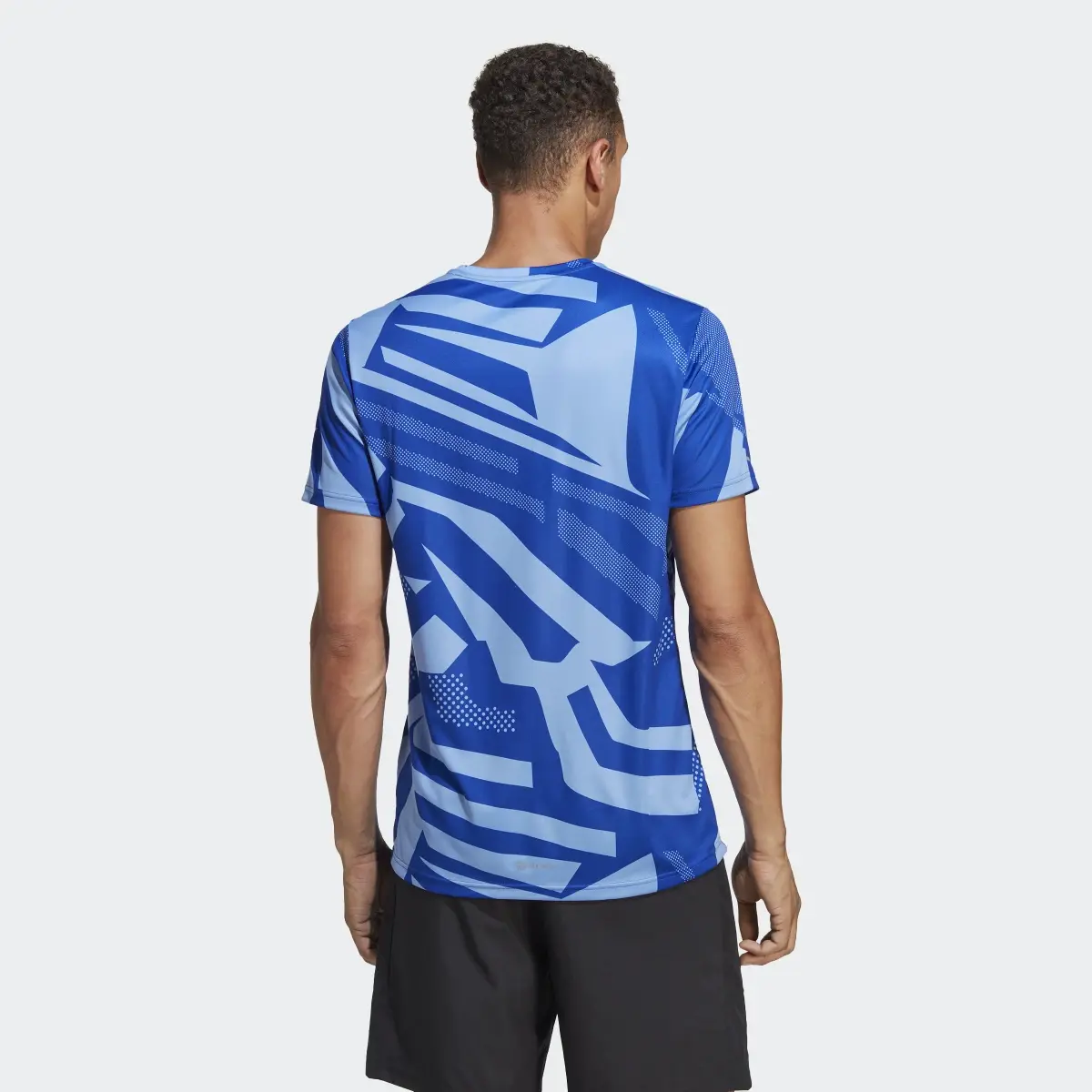 Adidas Playera Own the Run Seasonal. 3