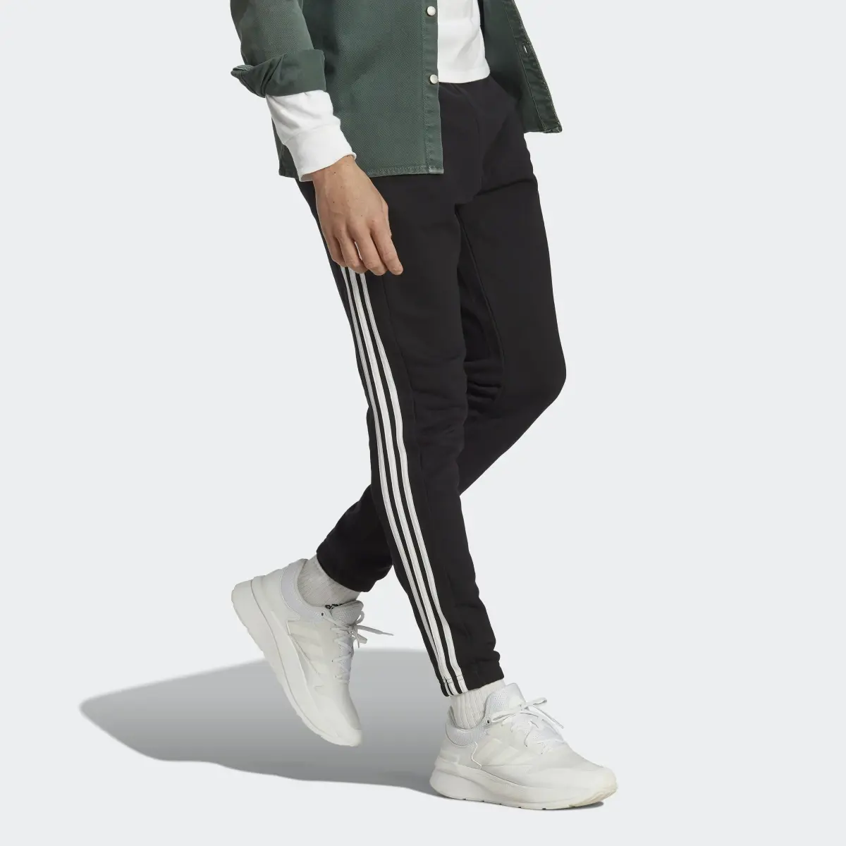 Adidas Essentials French Terry Tapered Elastic Cuff 3-Stripes Joggers. 3