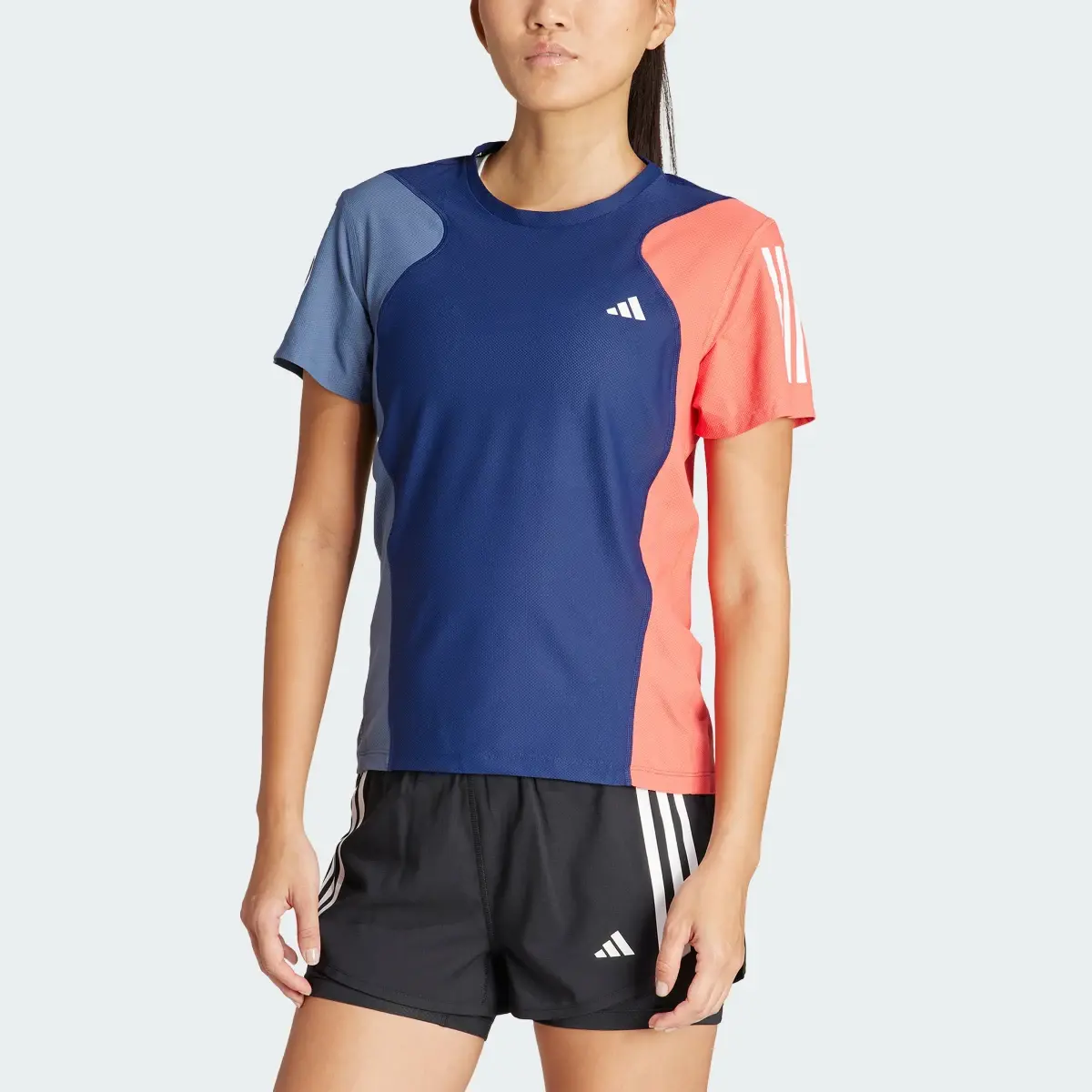 Adidas Playera Own the Run Colorblock. 1