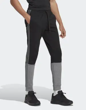 Adidas Pantaloni Essentials Mélange French Terry. 3