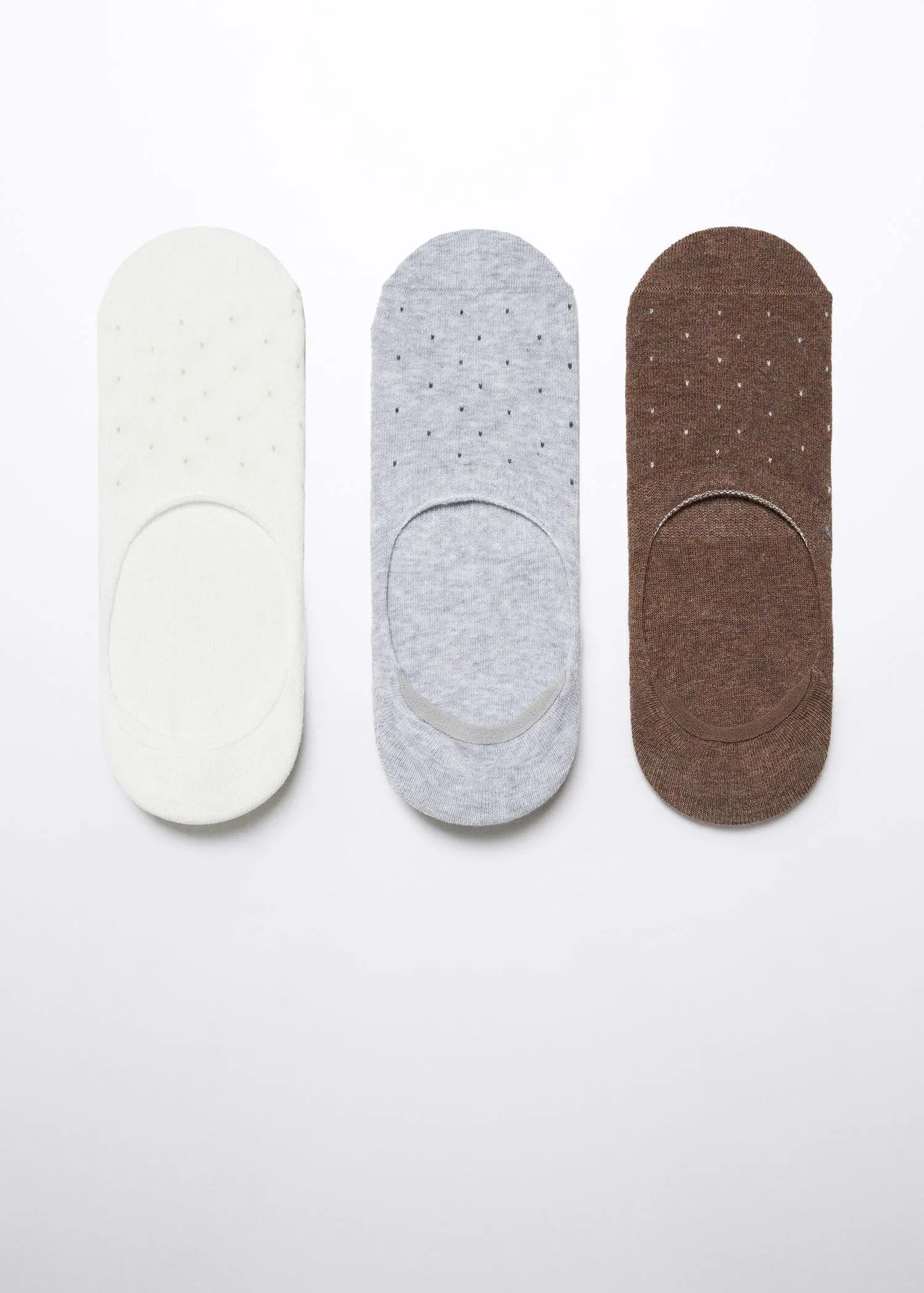 Mango 3-pack of polka-dot print socks. three pairs of different colored socks on top of a table. 