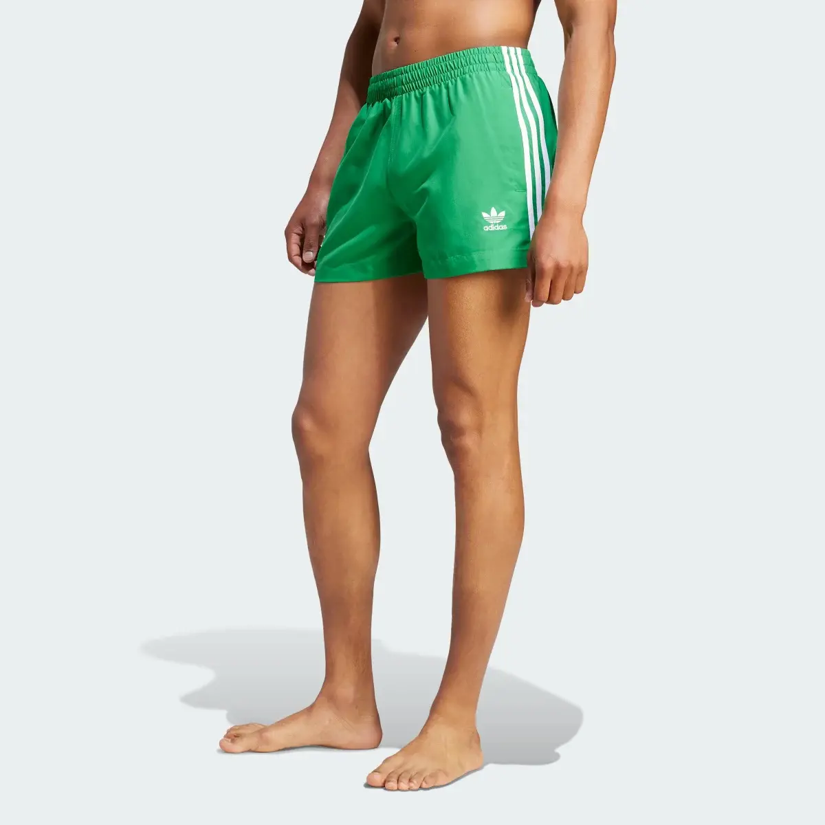 Adidas Adicolor 3-Stripes Swim Shorts. 1