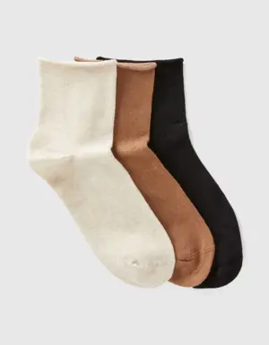 three pairs of short socks