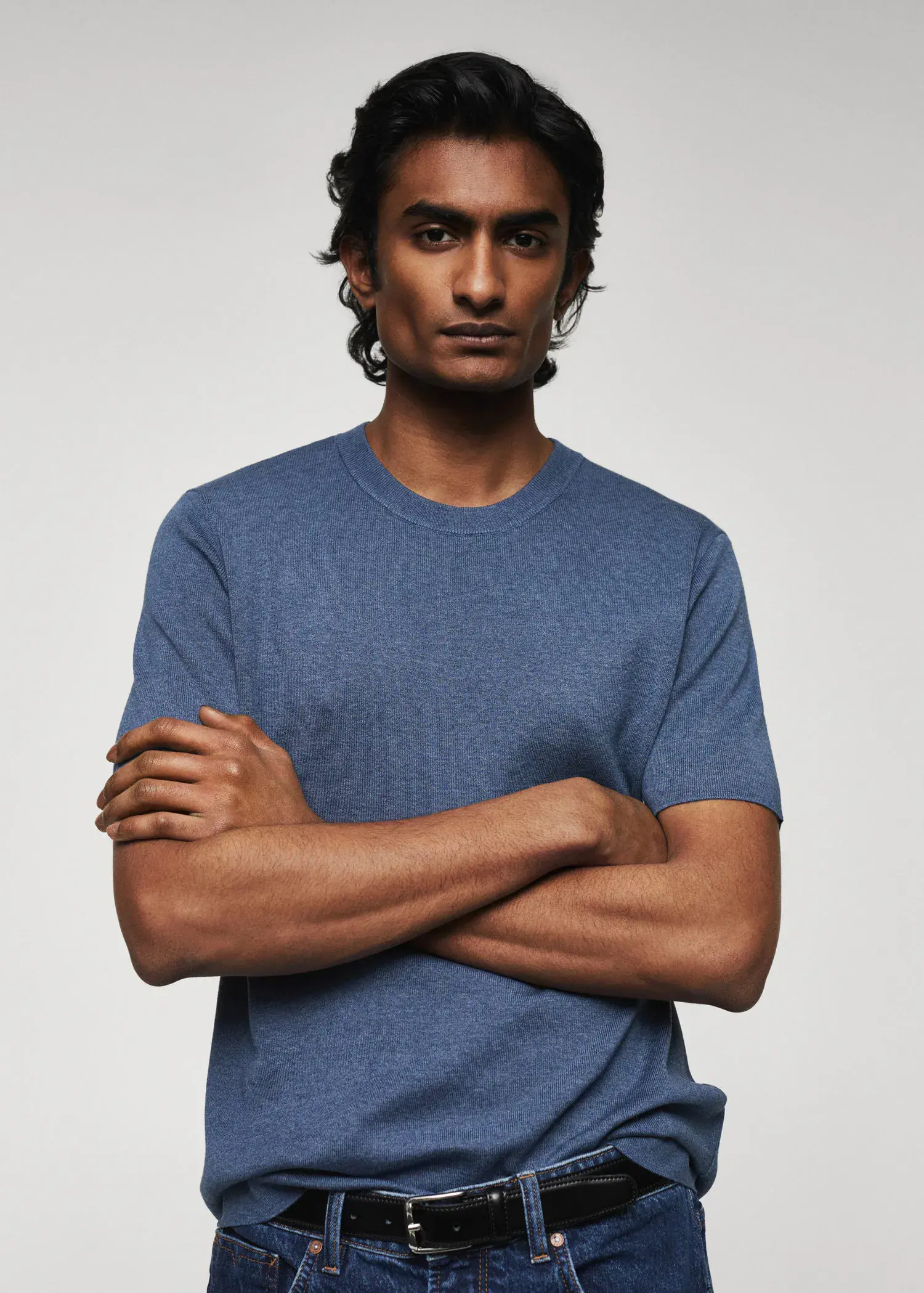 Mango Cotton fine-knit t-shirt. a man with his arms crossed wearing a t-shirt. 