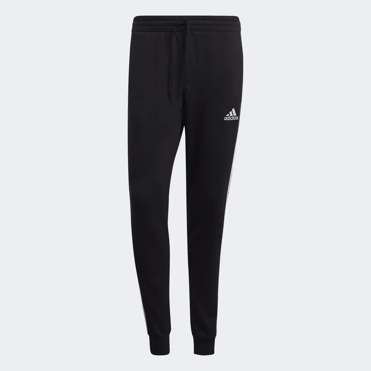 Adidas Essentials Fleece Fitted 3-Stripes Joggers. 1