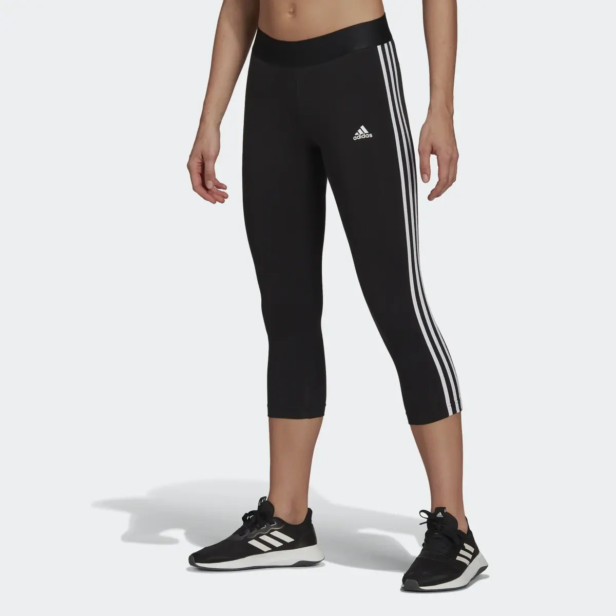 Adidas Essentials 3-Stripes 3/4 Length Leggings. 1