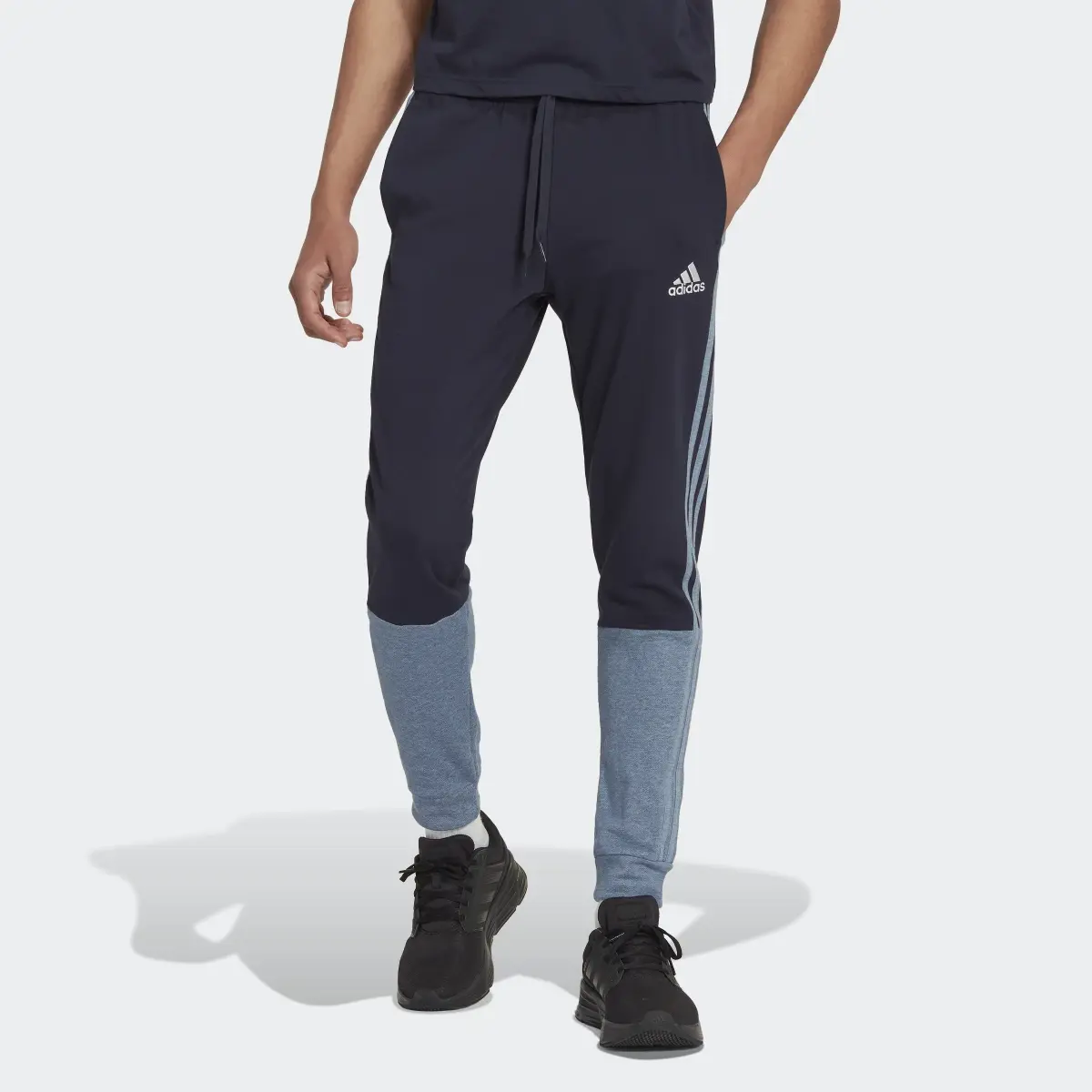 Adidas Essentials Mélange French Terry Joggers. 1