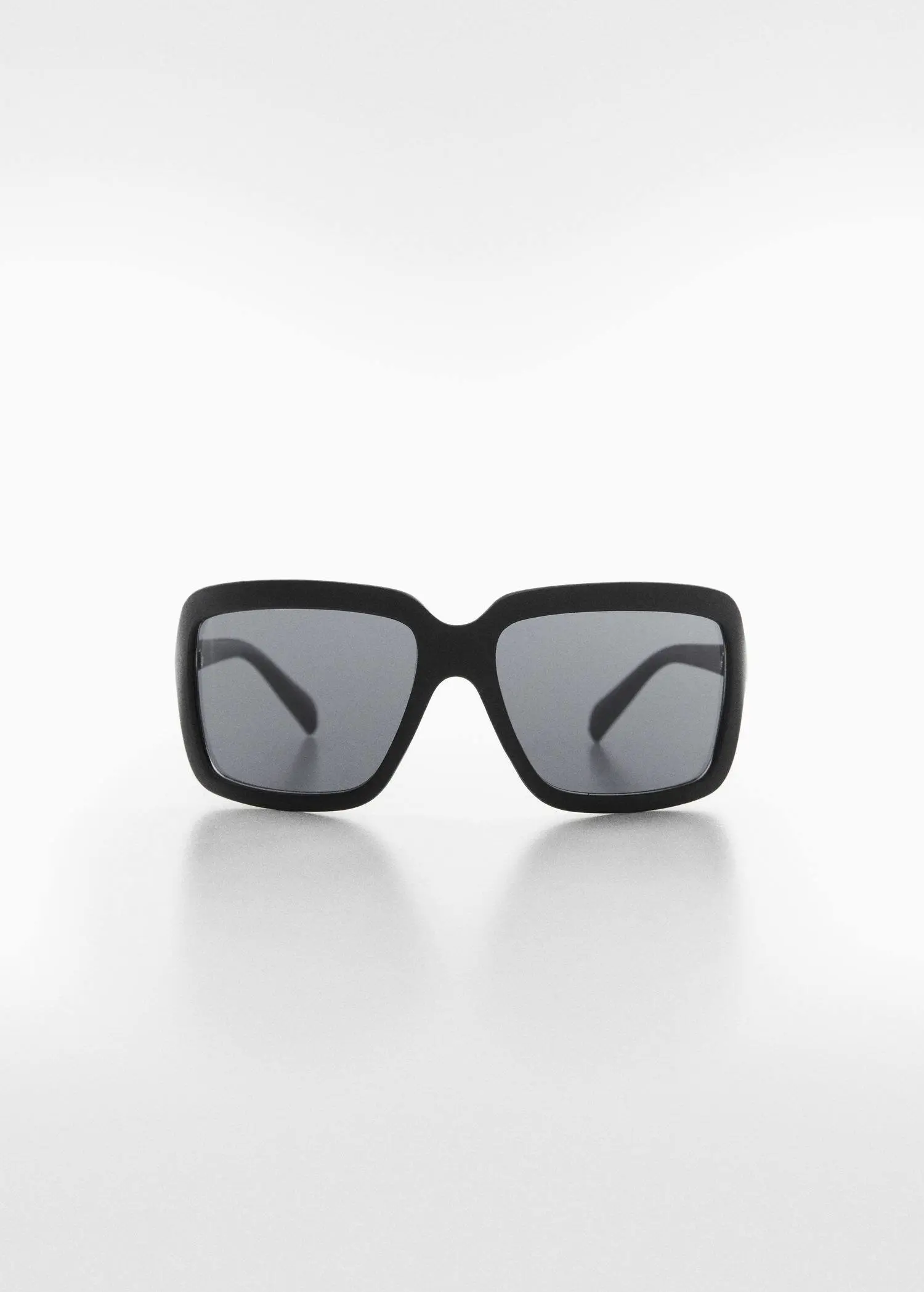 Mango Squared frame sunglasses. a pair of sunglasses on a white surface. 