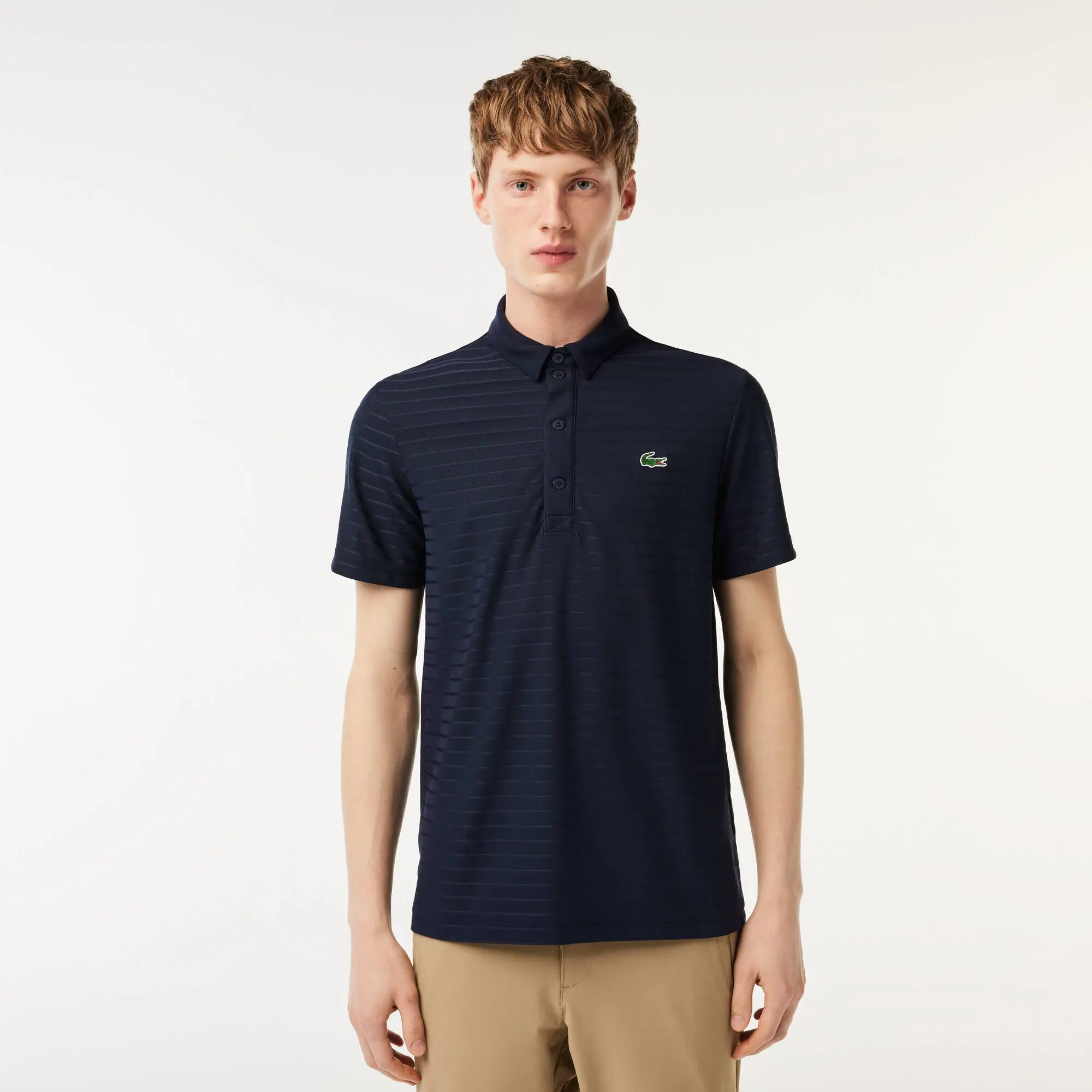 Lacoste Men's SPORT Textured Breathable Golf Polo. 1