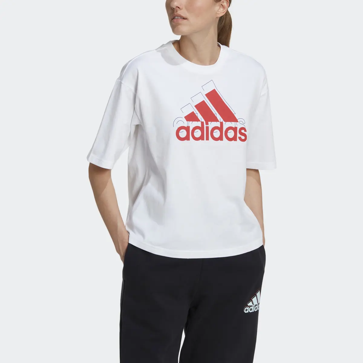 Adidas Essentials Multi-Colored Logo Loose Fit Cropped Tee. 1