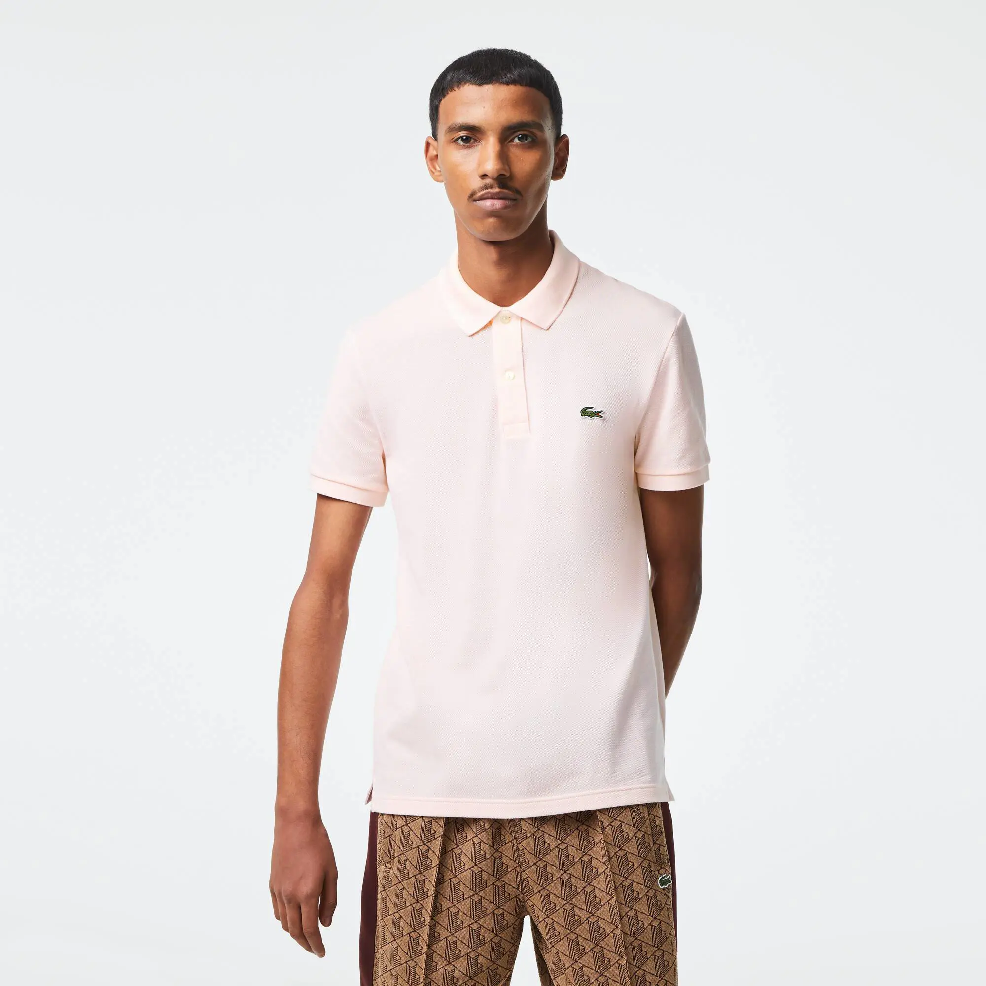 Lacoste Men's Original L.12.12 Slim Fit Petit Piqué Cotton Polo. 1 Lacoste Men's Original L.12.12 Slim Fit Petit Piqué Cotton Polo. 1