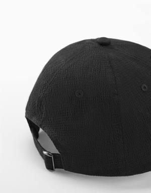 Textured cap with visor
