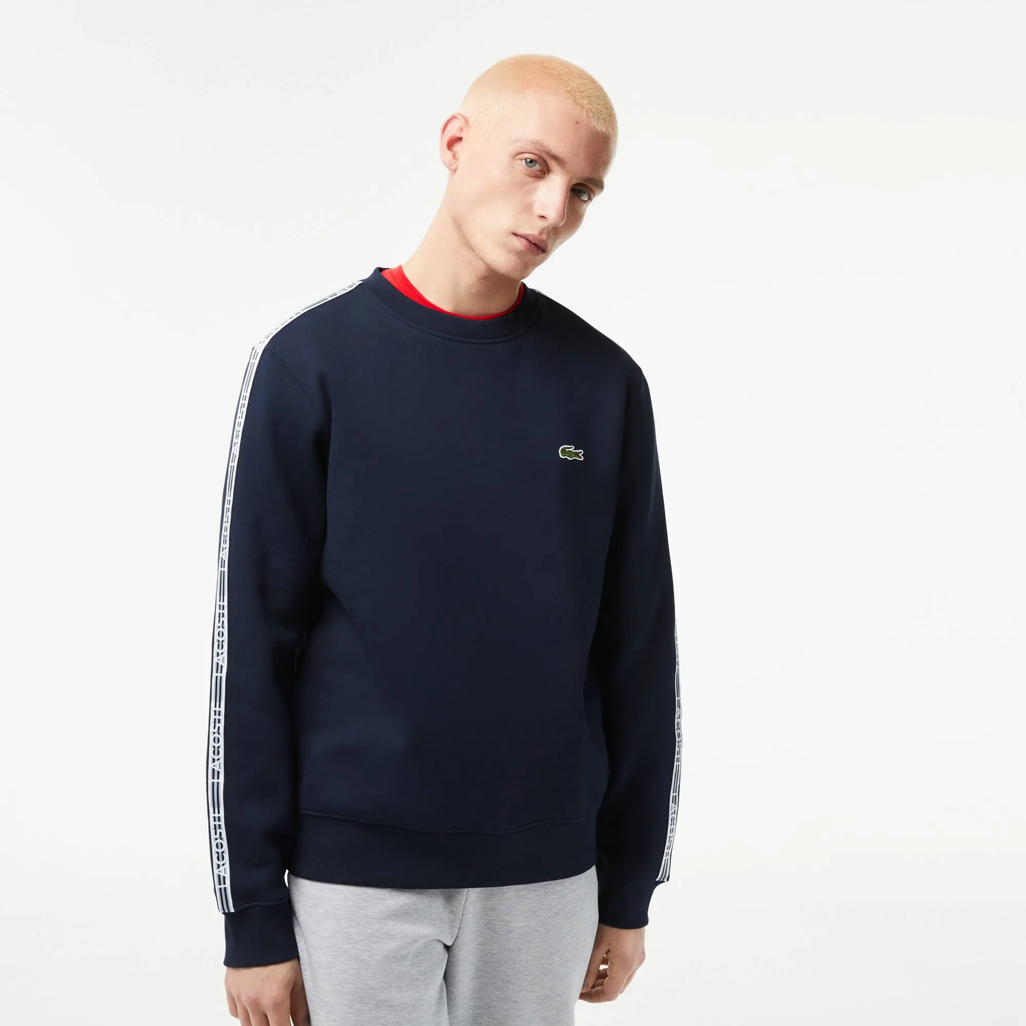Lacoste Felpa Jogger da uomo in flanella a righe con logo e taglio classico. 1 Lacoste Felpa Jogger da uomo in flanella a righe con logo e taglio classico. 1