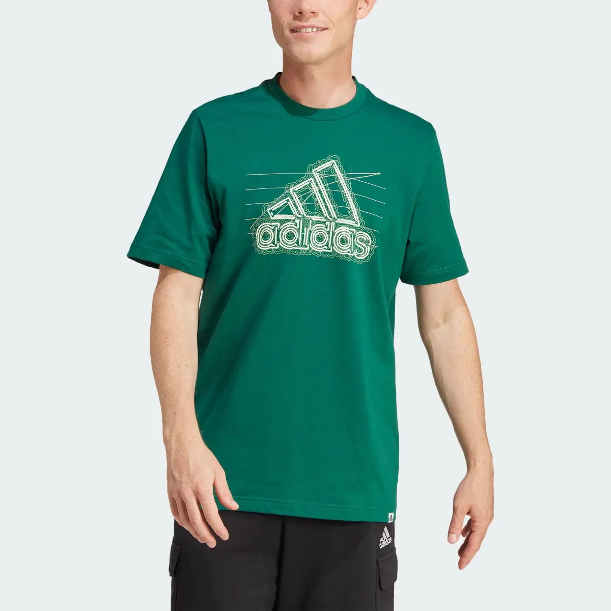 Adidas Growth Badge Graphic T-Shirt. 1