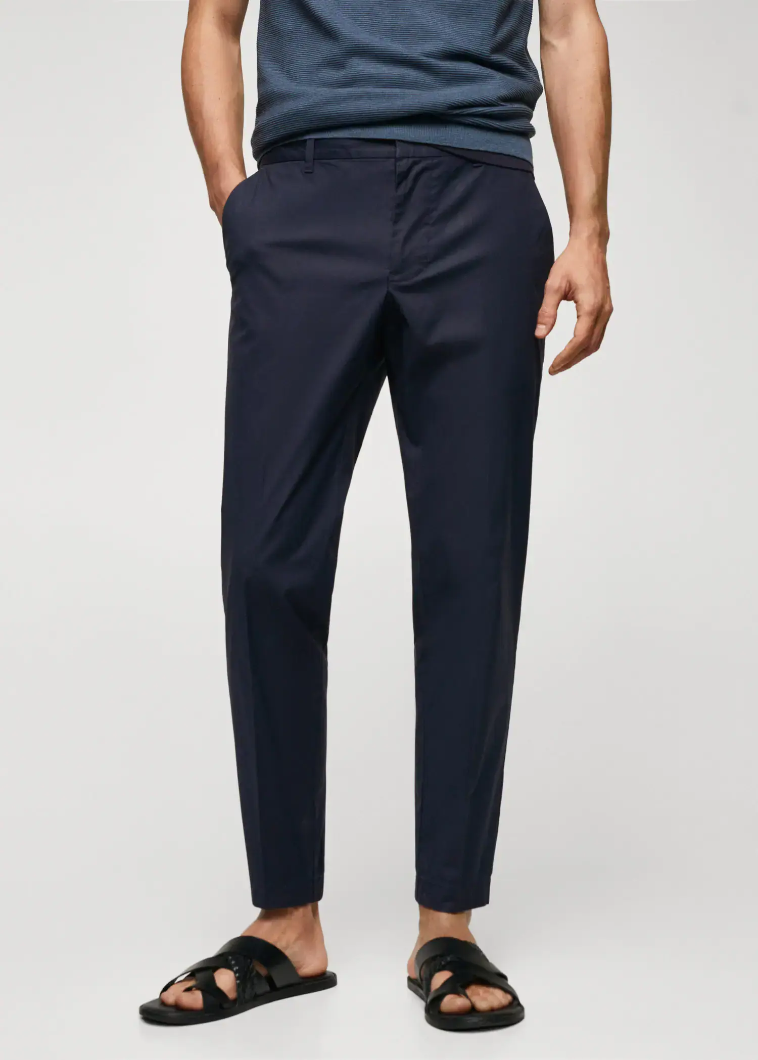 Mango Slim-fit cotton pants. a man wearing a black suit pants and white shirt. 