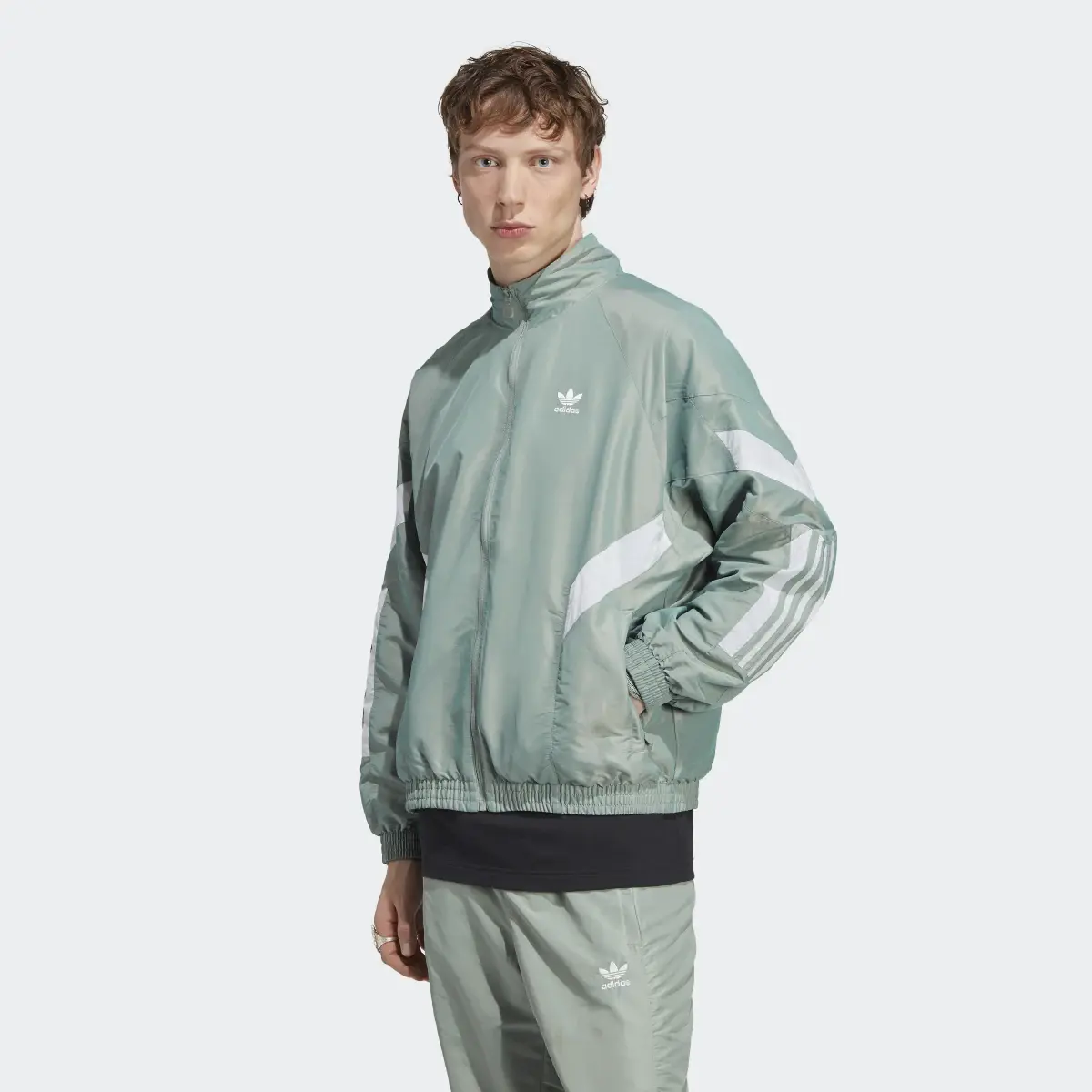 Adidas Rekive Woven Track Top. 2