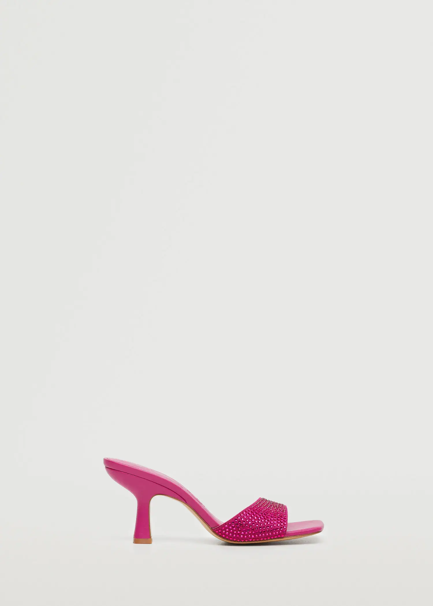 Mango Glitter high-heeled sandals. a pair of pink high heeled shoes sitting on top of a table. 