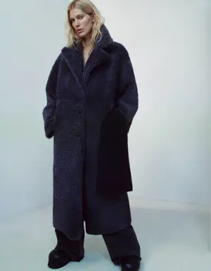 Reversible sheepskin fur-effect coat