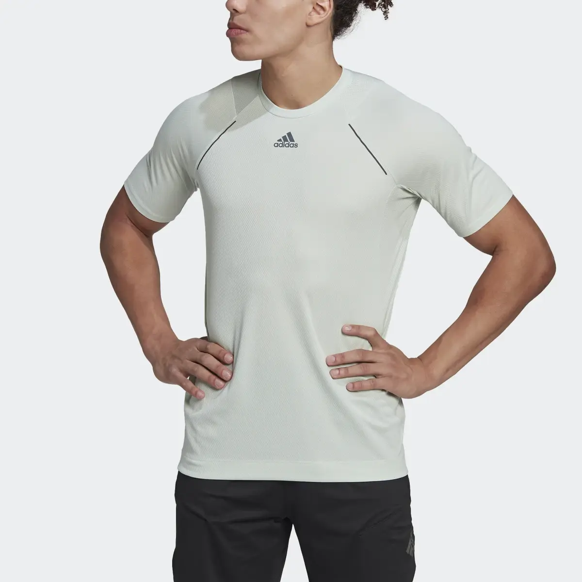 Adidas HIIT Spin Training Tee. 1