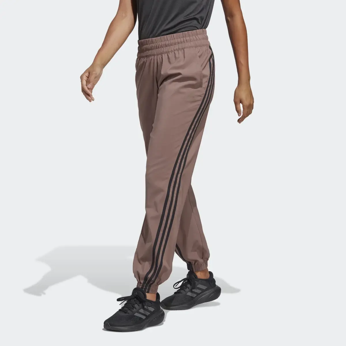 Adidas TRAINICONS 3-Stripes Woven Pants. 1