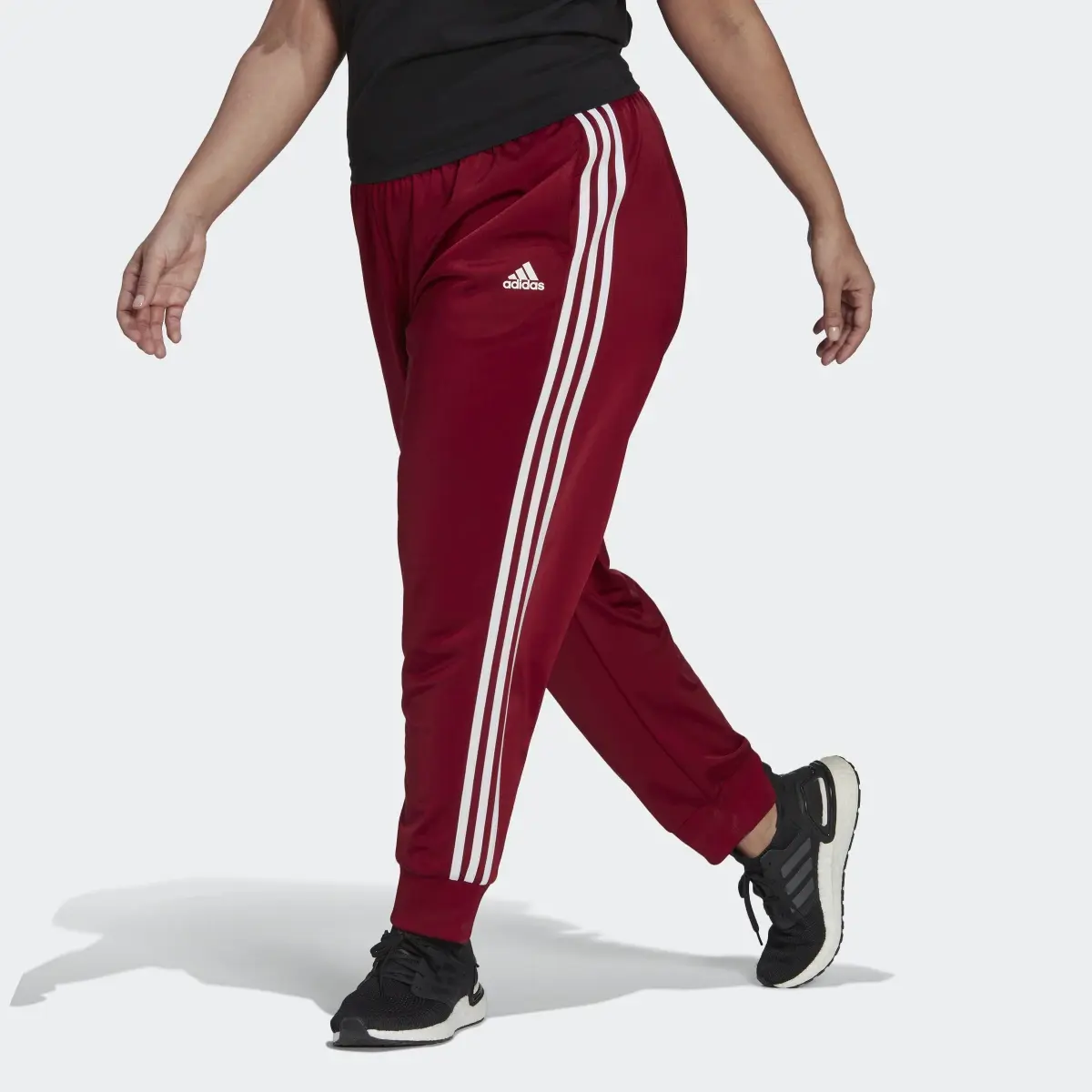 Adidas Essentials Warm-Up Slim Tapered 3-Stripes Track Pants (Plus Size). 1