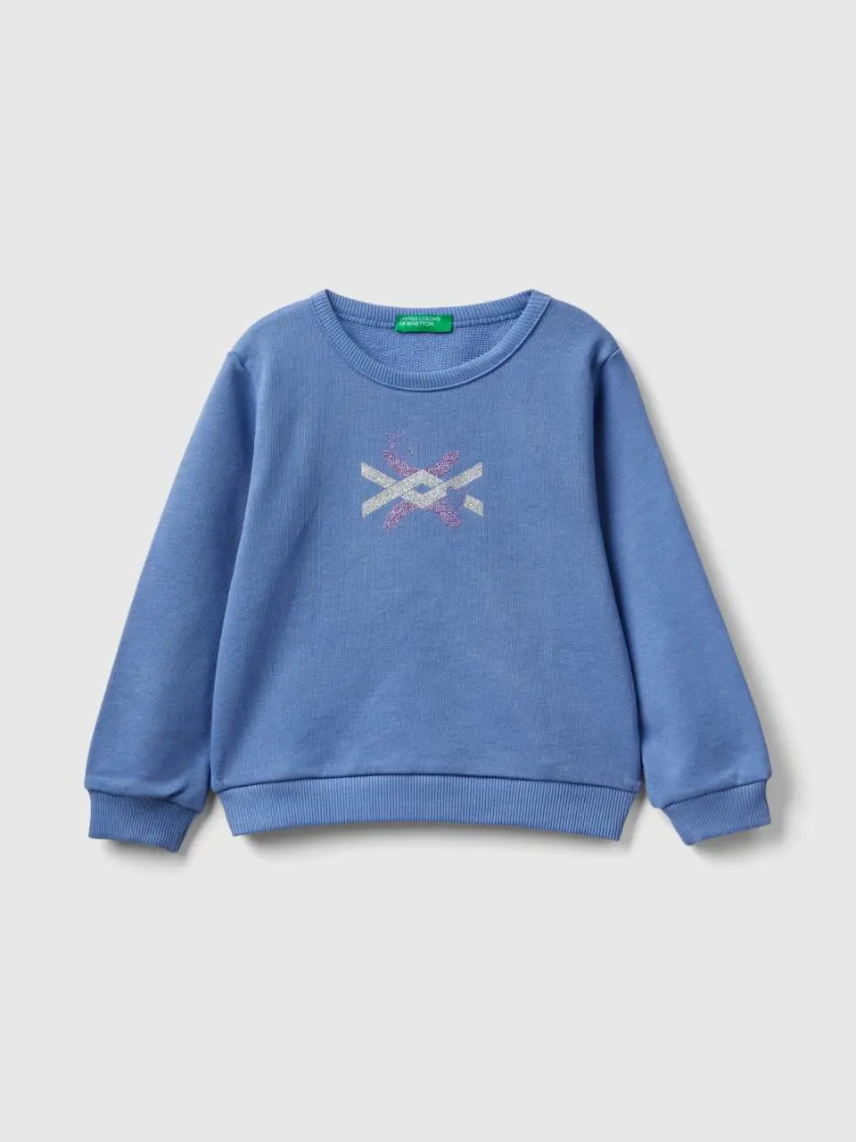 Benetton sky blue sweatshirt in organic cotton with glittery print. 1