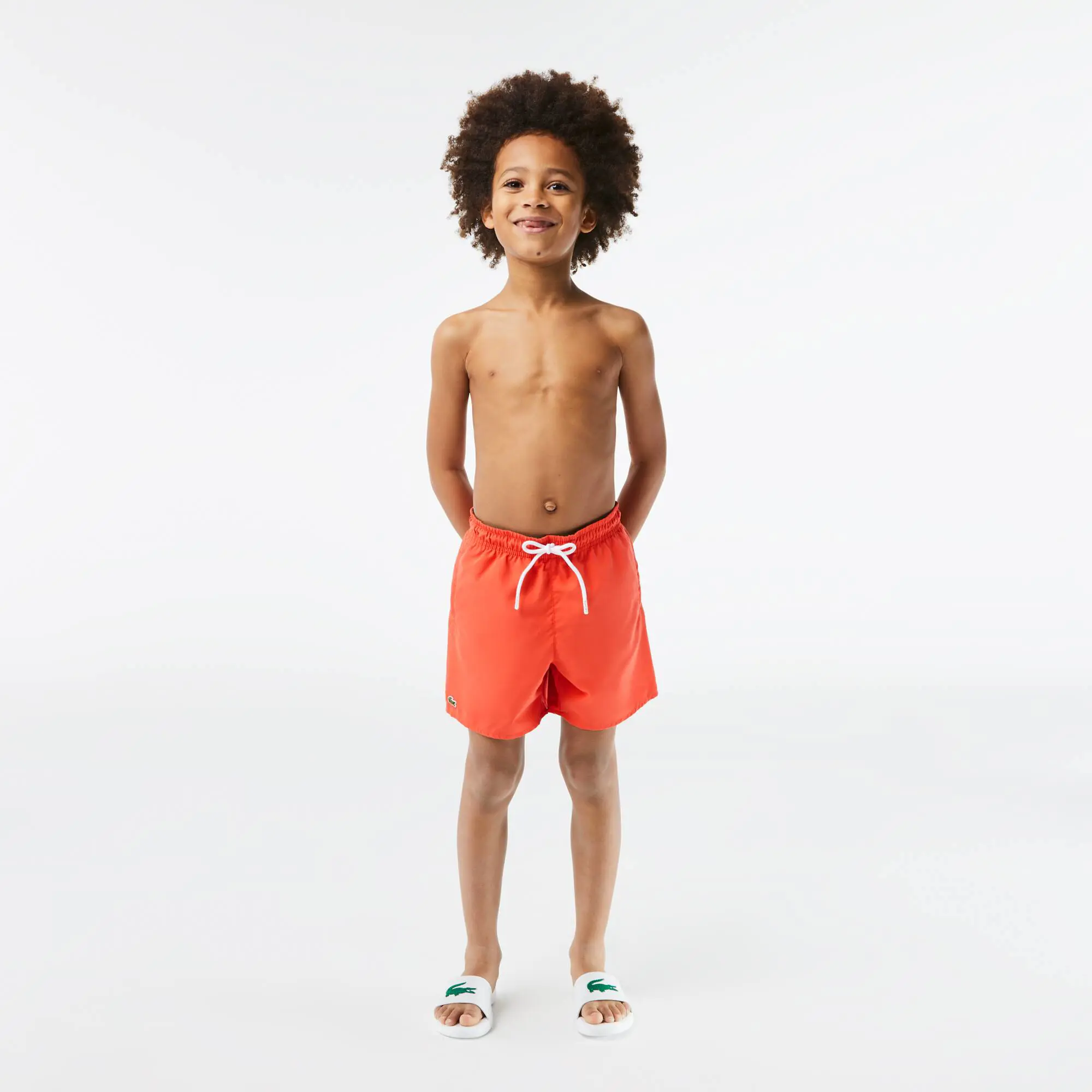 Lacoste Boys' Quick-Dry Solid Swim Shorts. 1