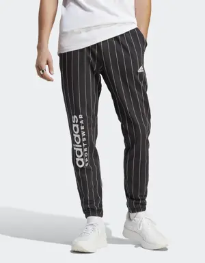 Adidas Pantalon en molleton à fines rayures