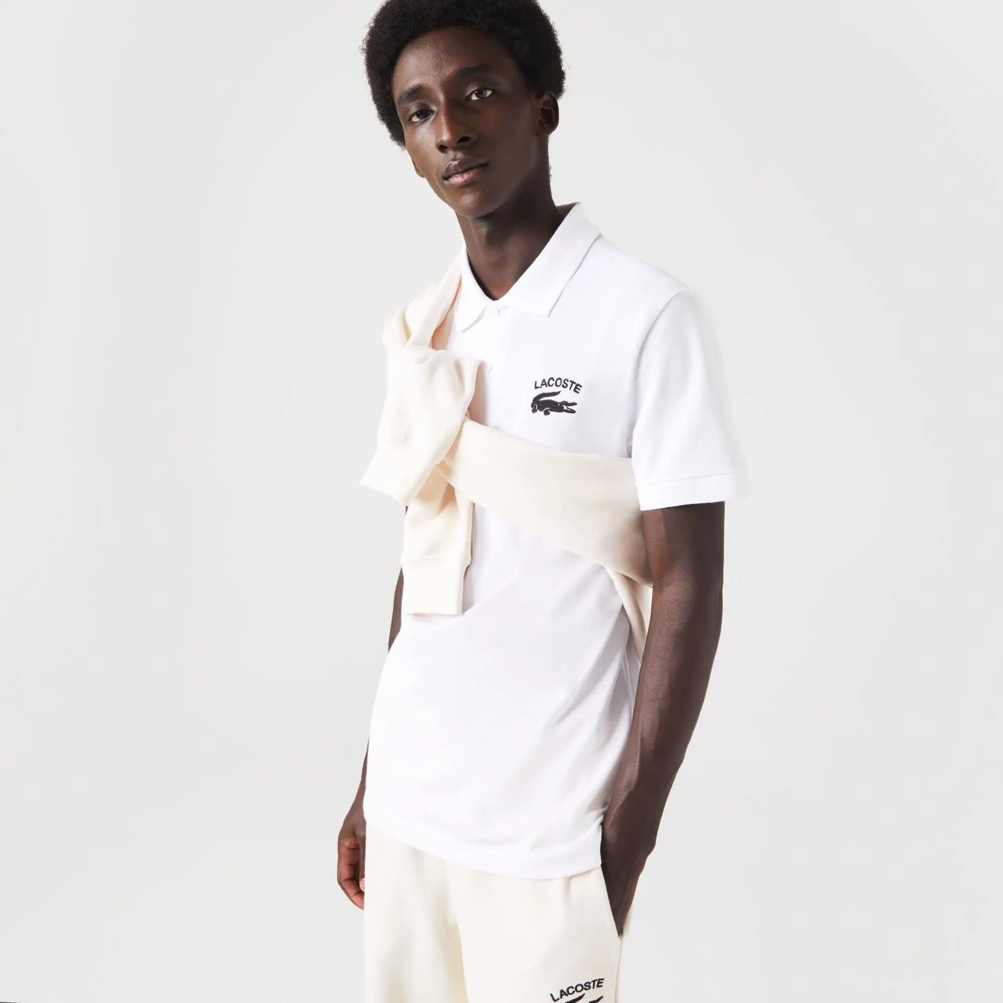 Lacoste Herren-Poloshirt aus Stretch-Mini-Piqué. 1