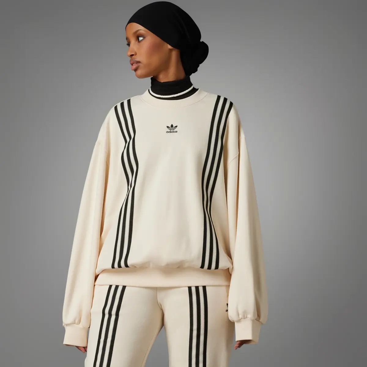 Adidas adicolor 70s 3-Streifen Sweatshirt. 3