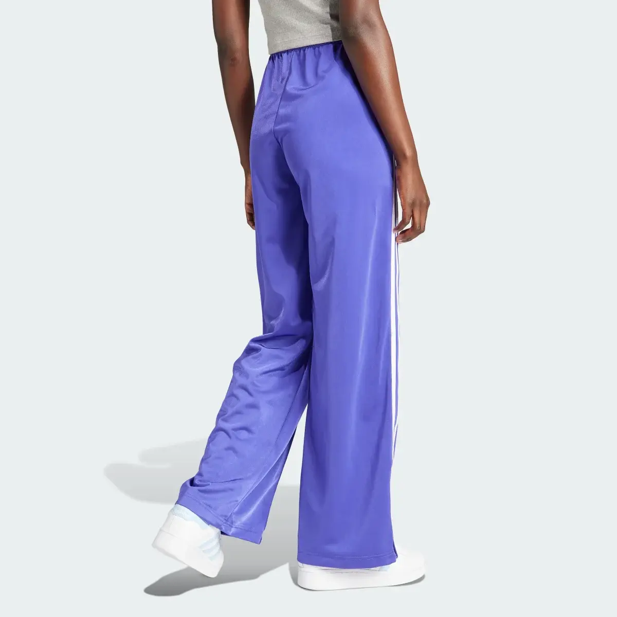 Adidas Pantalon de survêtement ample Firebird. 2