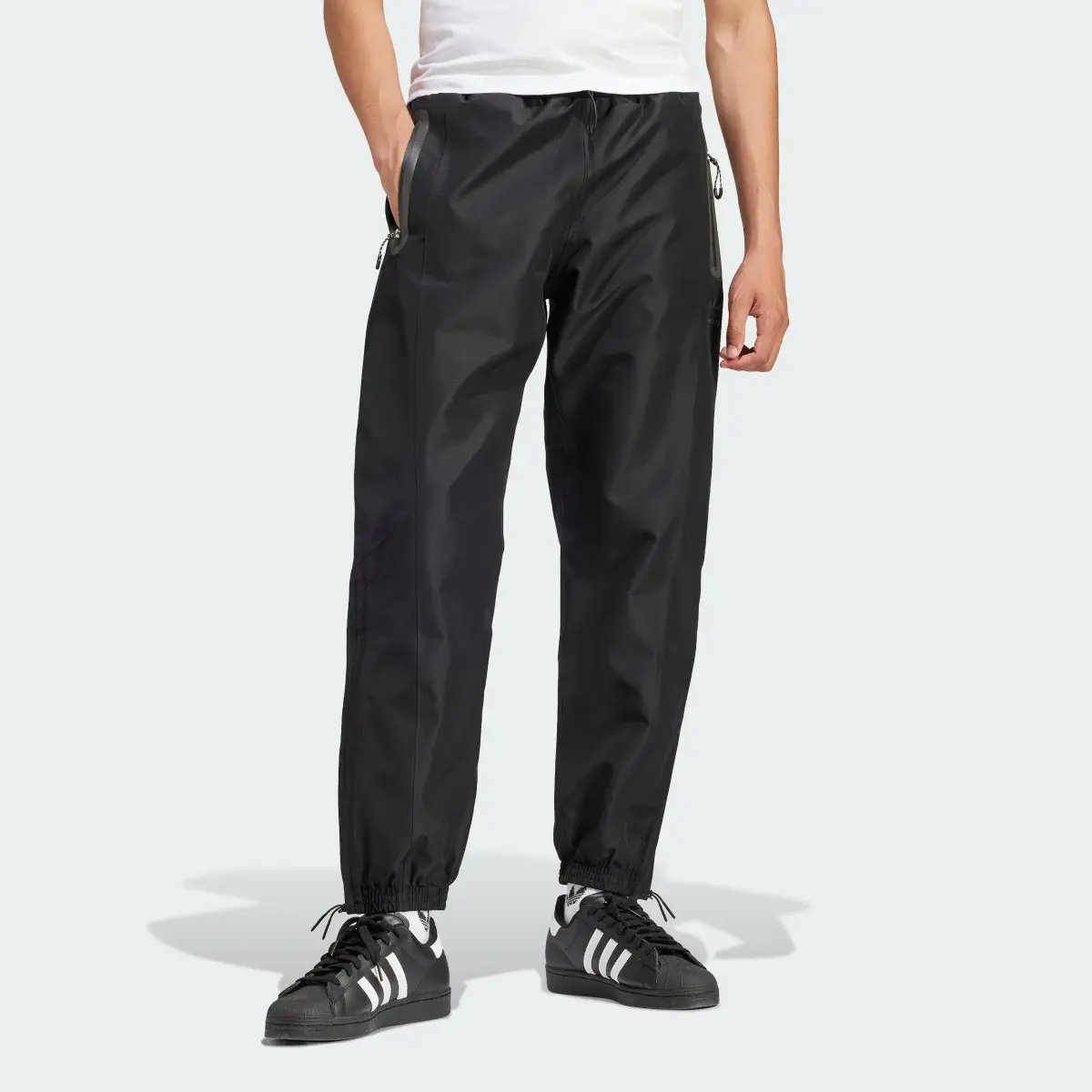 Adidas Pantalon maille double empiècement. 1