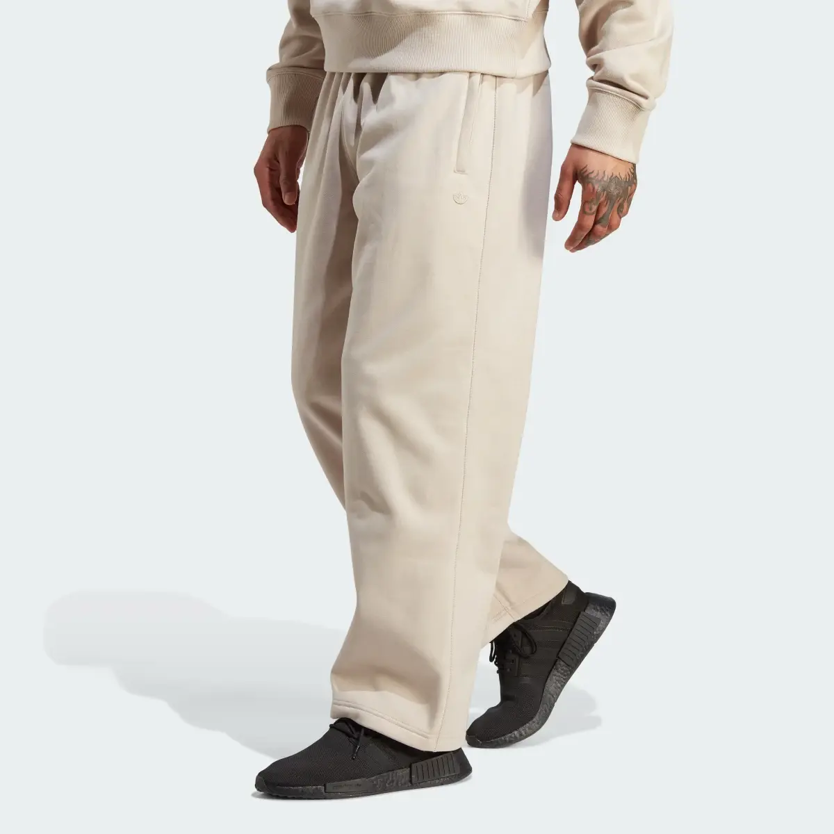 Adidas Premium Essentials Wide Leg Joggers. 1