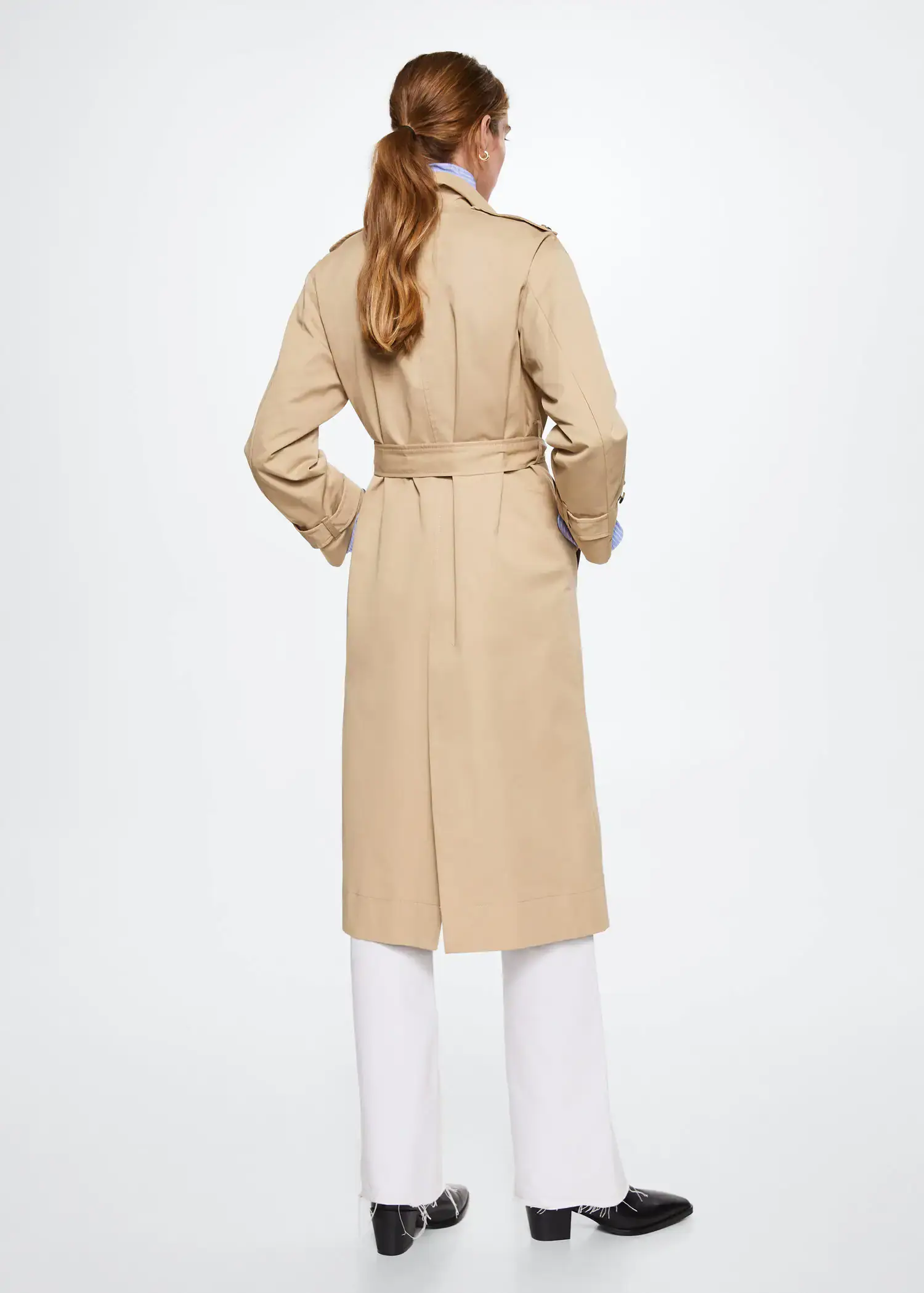 Mango Cotton classic trench coat. a woman wearing a tan trench coat and white pants. 