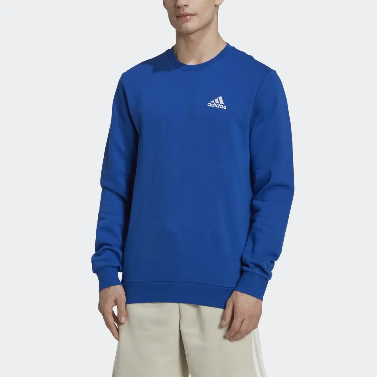 Adidas Essentials Fleece Sweatshirt. 1