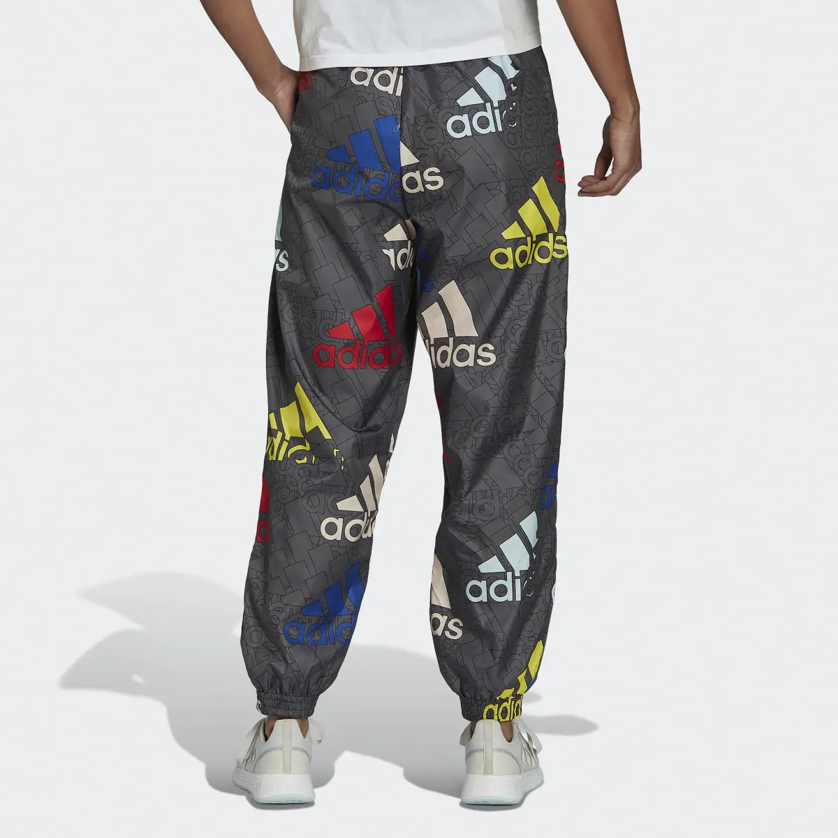 Adidas Essentials Multi-Colored Logo Loose Fit Woven Pants. 3