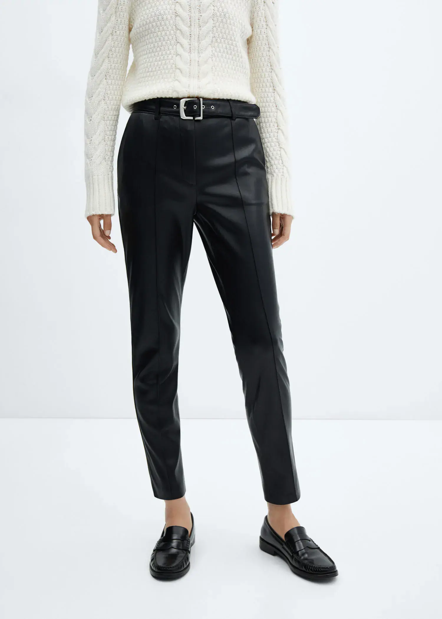 Mango Leather-effect trousers with belt. 2