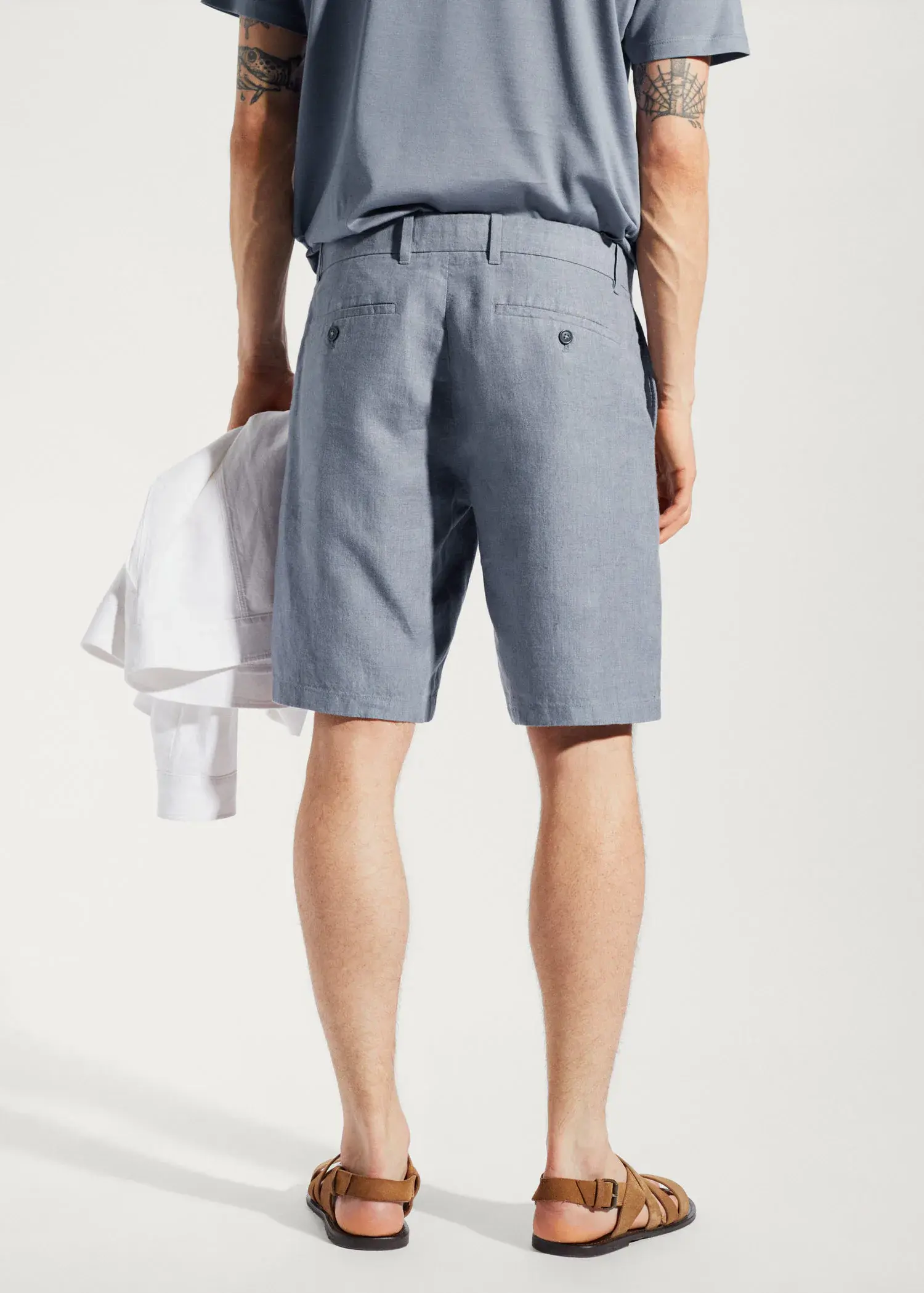 Mango 100% linen shorts. a person wearing a pair of shorts and a shirt. 