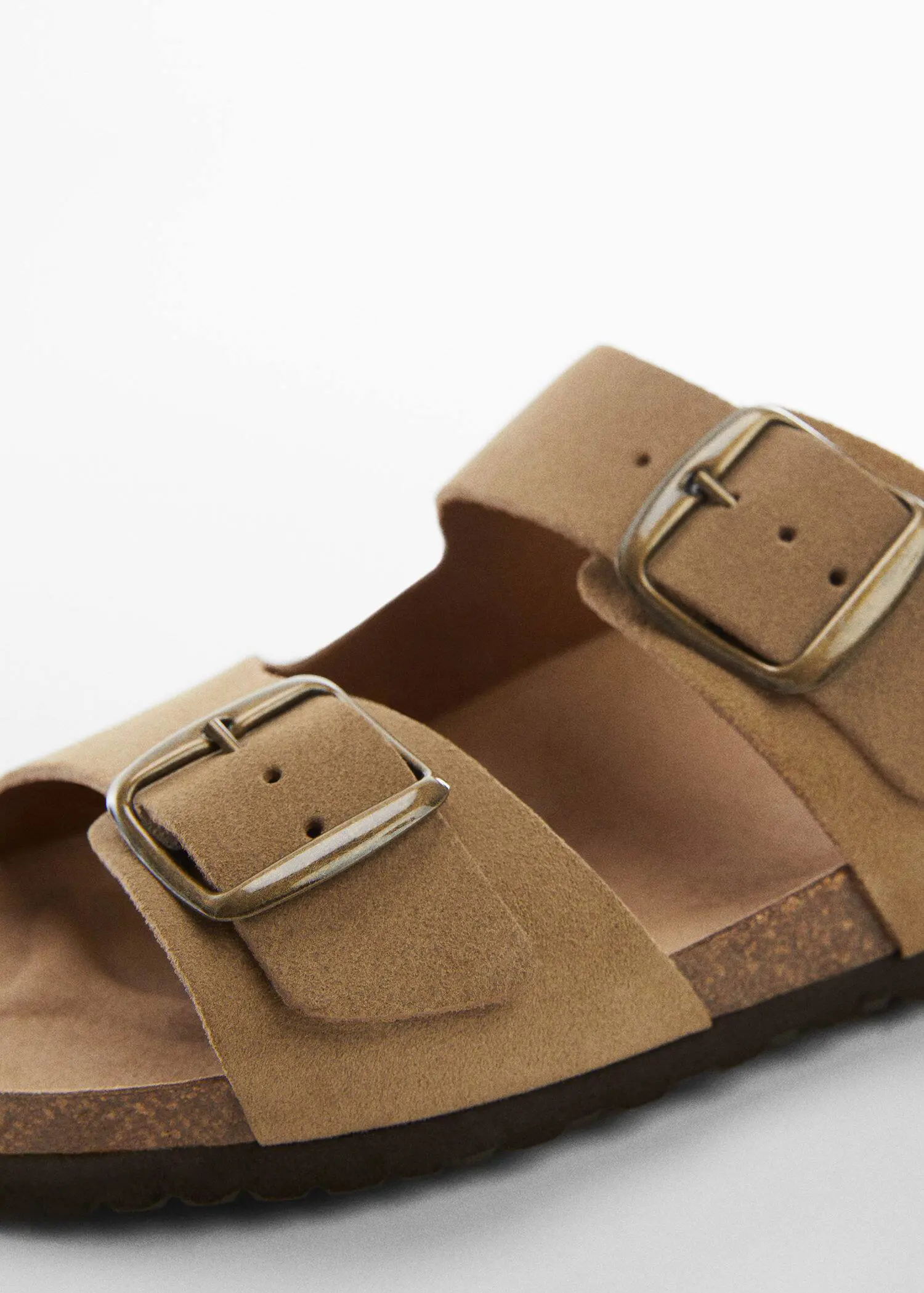 Mango Split leather sandals with buckle. a close up view of a pair of sandals. 